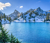 USA, Washington State, Alpine Lakes Wilderness. Gem Lake and Kaleetan Peak with new snow