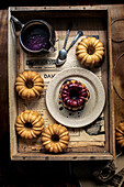 Small lemon bundt cakes with blueberry icing