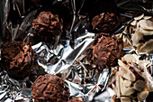 Chocolate truffles with almond slivers