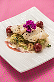 Haddock with summer savoy cabbage and glazed cherries