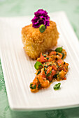 Fried camembert with tomato and basil relish