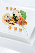 Langoustine with chickpea cream and spinach leaves