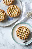 Small apple pie with pastry lattice