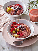 Millet porridge with fresh berries and cinnamon