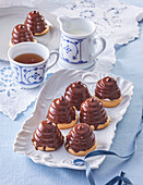 Chocolate mousse tartlets with chocolate icing