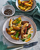 Stuffed chicken breast with potato wedges