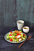 Salad with sesame and feta sticks