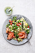 Colourful quinoa salad with smoked salmon