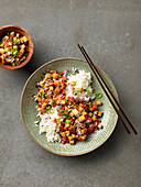 Fried tofu with vegetables and rice