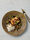 Tofu steak with rice and mushrooms