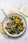 Potato and chard pan with courgettes and mushrooms
