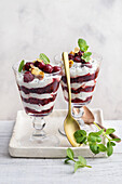 Layered dessert with cherries and yoghurt