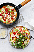 Frittata with tomatoes, spring onions and rocket
