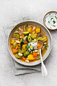 Vegetable stew with white beans and herb dip