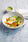 Steamed vegetables with egg and dip