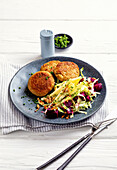 Green spelt patties with coleslaw and beetroot strips