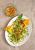 Courgette salad with courgette flowers and vinaigrette