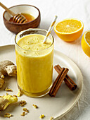 Spicy ginger and cinnamon smoothie with honey