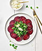 Beetroot carpaccio with goat's cheese and lamb's lettuce