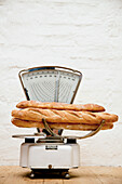 Baguettes on kitchen scales