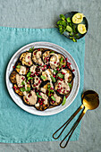 Oriental aubergine salad with hummus and pomegranate seeds