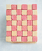 Chessboard cake with vanilla and strawberry wafers