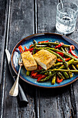 Tofu with green asparagus and red pepper