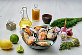 Raw mussels with herbs and lemons