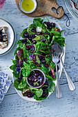 Spinach salad with blueberry chutney