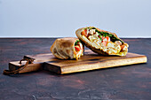 Stuffed pita with chicken, tomato and omelette