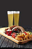 Beer snack: homemade sausage, vegetable skewers and potato balls