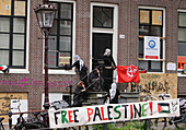 Pro-Palestinian students up a barricade protest against the ongoing conflict Israel and the Palestinian on the campus University of Amsterdam on May 8, 2023 in Amsterdam,Netherlands.
