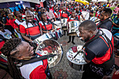 People celebrating World Steel Pan Day Parade in Trinidad and Tobago