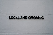 Local and Organic sign in cafe, Madrid, Spain