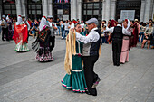 Mature dancers dance the traditional chotis during the San Isidro festivities in Madrid, Spain