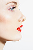 Close up Profile of Young Woman with Red Lips