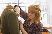 Seamstress Working on Dummy