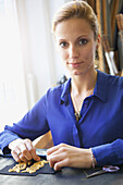 Portrait of Female Employee at Embroidery Design Studio