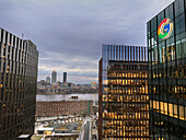 MIT Museum (left foreground), Google office building (right, foreground), Cambridge, with view across Charles River to Boston, Massachusetts, USA