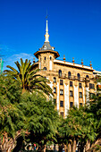 San Sebastian,Spain - 07 September 2019 - View of building and a palm tree from Alderdi-Eder park