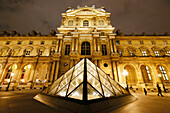 Paris. 1st district. Louvre Museum by night. In the foreground one of the secondary pyramids (architect: Ieoh Ming Pei). In the background,the Richelieu pavilion. Mandatory credit of the architect architect: Ieoh Ming Pei