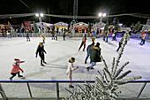 Paris. 1st district. The Tuileries Garden by night. Fun fair at the end of the year. The rink.