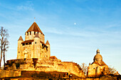 Seine et Marne. Provins,medieval city,Saint-Quiriace collegiate on the right and Caesar tower on the left at sunset.