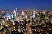 USA. New York City. Manhattan. Empire State Building. View from the top of the building at dusk and night. View to the north of the midtown Manhattan,in direction of Central Park.