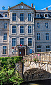 France,Quercy,Lot,Saint Cere,Jean Lurcat public high school (facade 18th century) and bridge on the Bave river