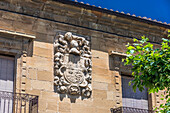 Spain,Rioja,San Vicente de la Sonsierra,stone coat of arms on a facade