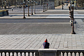 France,Paris,75,5th arrondissement,Place de la Concorde empty,a man seen from the back,winter