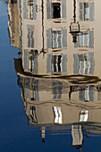 France,Paris,75,10th ARRT,Quai de Valmy,reflection of a building in the Canal Saint-Martin