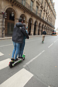 France,Paris,75,1st arrondissement,Rue de Rivoli,two on a scooter.