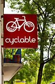France,Nantes,44,Quai de Versailles,sign for the "Cyclable Nantes" bicycle shop.